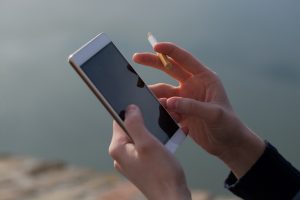 Phone and cigarette