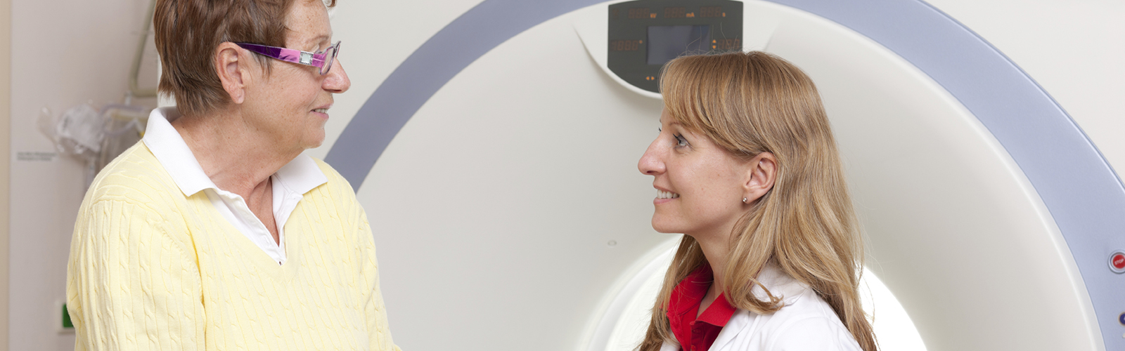 A doctor speaks with an oncology patient