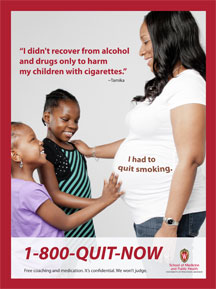 A pregnant mom and her two daughters are happy the mom quit smoking